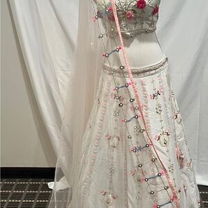 Elegant White Lehenga with Pink Floral Details